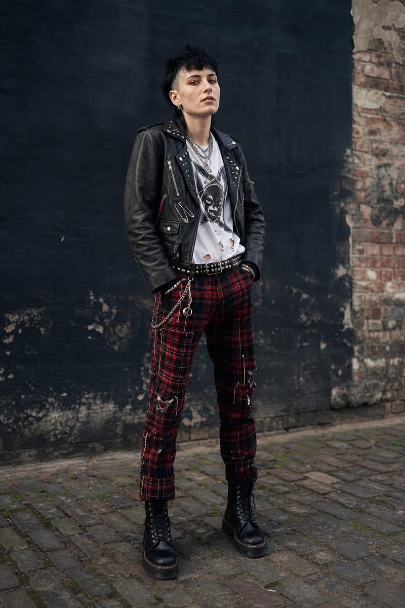 Punk style: leather jacket and tartan trousers